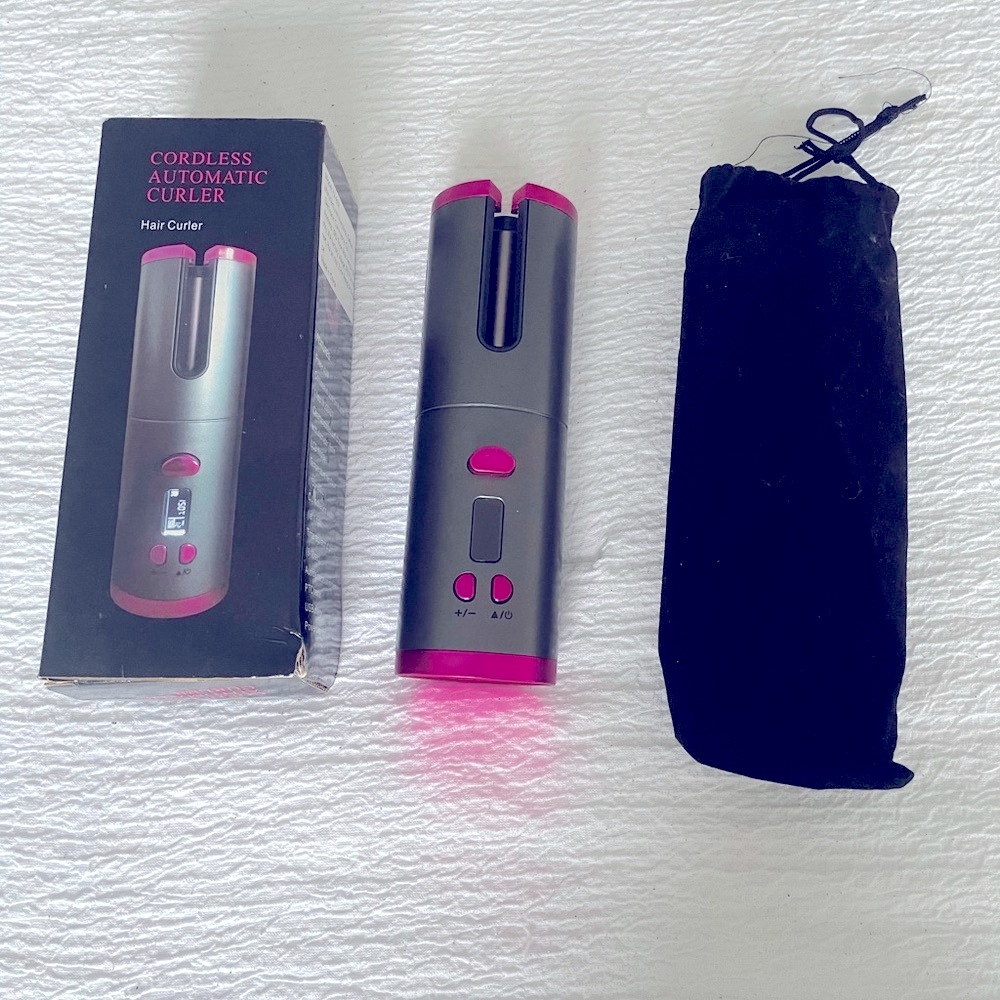Black and Pink Hair Styling Tool with Electronic Display